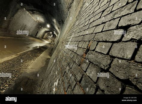 Cycle path through Headstone Tunnel, a former railway tunnel at Monsal Head in the Peak District ...