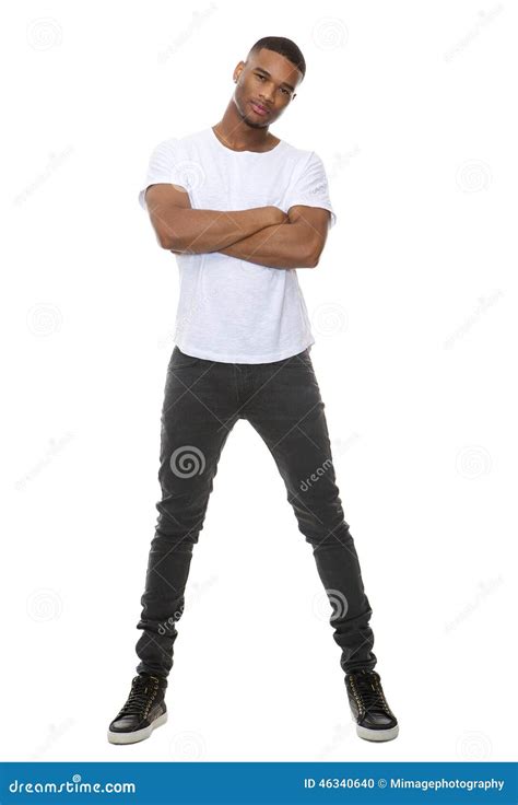 Portrait of a Confident Young Man Posing with Arms Crossed Stock Photo ...