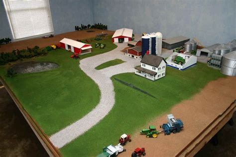 a toy farm scene is displayed on a table