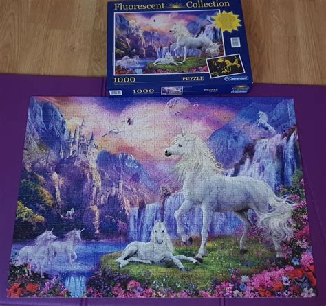 Unicorn Fluorescent Puzzle 1000 pieces by Clementoni. Fun to do and gives another use for a yoga ...