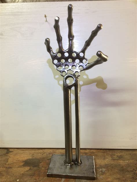 Metal hand sculpture I made from nuts and bolts | Metal art, Scrap ...