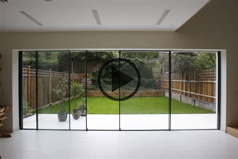 Bi parting minimal windows used as modern patio doors | Modern patio doors, Sliding doors ...