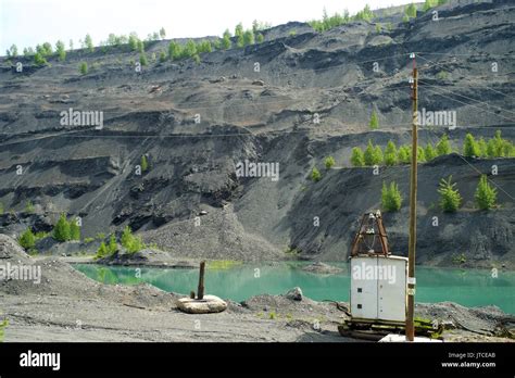 Abandoned quarry for coal mining in the Kemerovo region Stock Photo - Alamy