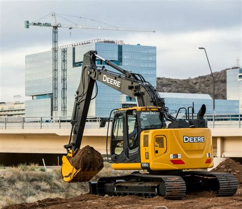 John Deere updates reduced-tail-swing excavators - Heavy Equipment Guide