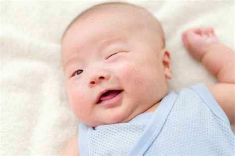 New born baby blink eye stock image. Image of blanket - 40944075