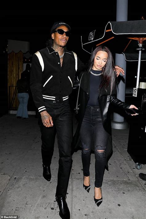 Wiz Khalifa and his lady Aimee Aguilar ooze cool in black as they enjoy ...