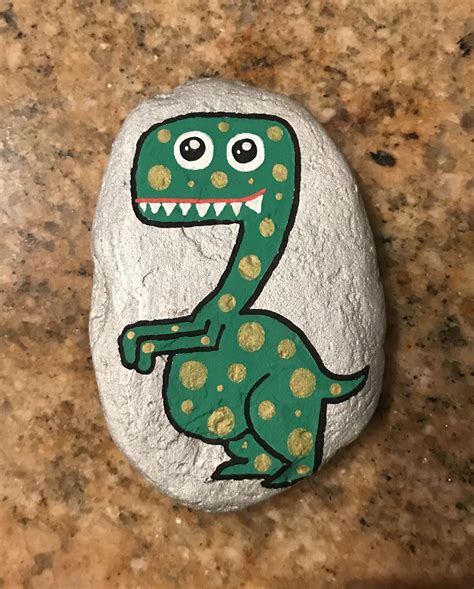 Dinosaur rock painting | Painted rocks kids, Painted rocks, Hand painted rocks