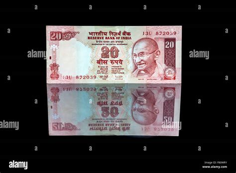 Indian twenty rupee note hi-res stock photography and images - Alamy