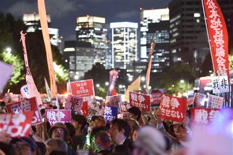 Japan: Thousands protest against government security bills and call for ...