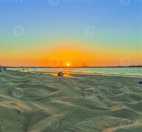 Beach scene in Dubai during sunset 17095763 Stock Photo at Vecteezy