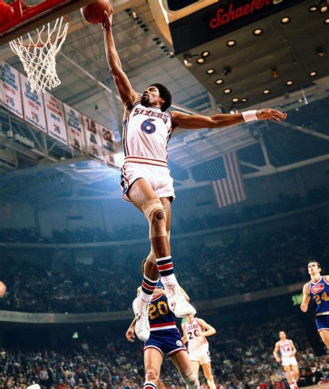 January 1977 | Philadelphia 76ers forward Julius Erving gets full extension on a one-handed dunk ...