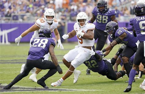 Robinson the engine behind the offense for No. 21 Texas | AP News