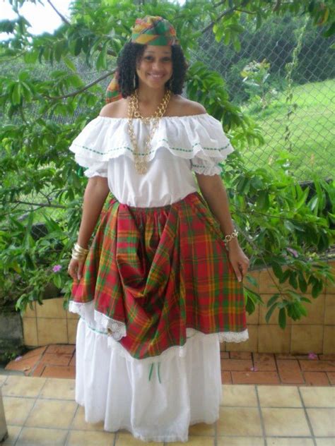 This is called the Creole dress. It is the traditional dress for girls ...