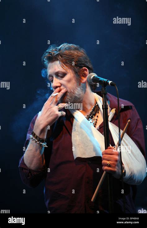 Shane MacGowan of The Pogues performing live on stage at V Festival ...