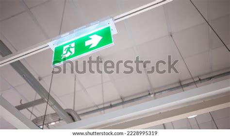 Green Emergency Exit Sign Fire Exit Stock Photo 2228995319 | Shutterstock