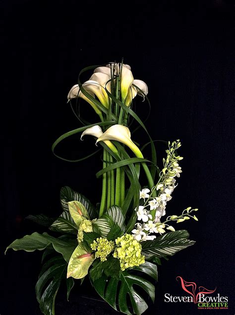 Long white Calla Lily flower arrangement/white calla lily wedding flowers centerpiece. Designed ...