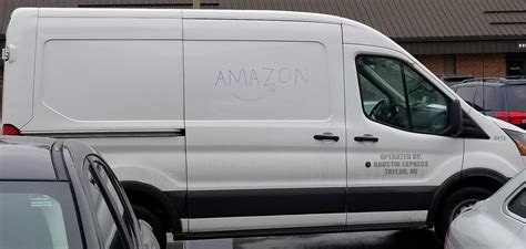 The Amazon delivery van had a hand drawn logo. : r/mildlyinteresting