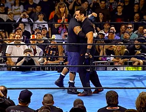 A shot of Raven and Tommy Dreamer hugging after Dreamer's first ECW ...