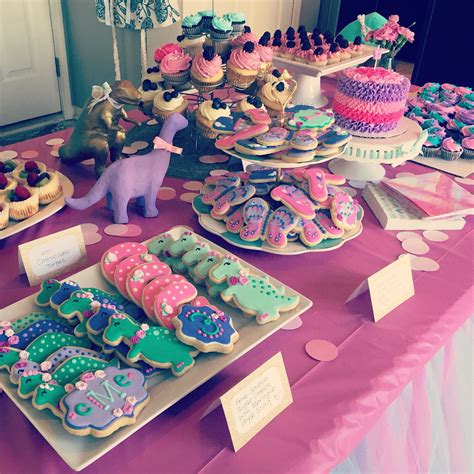 Girly dinosaur dessert table by Two Dolls Bakery http://Facebook.com ...