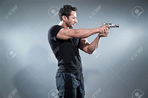 man holding pistol