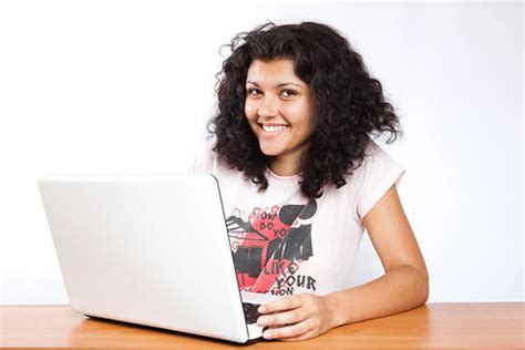 Laptop | A happy college student on her laptop | CollegeDegrees360 | Flickr