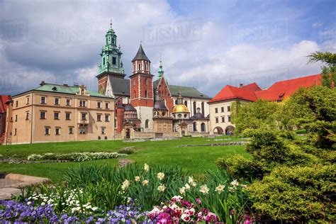 Poland. Krakow. Wawel Castle. Blooming park and domes of the cathedral ...