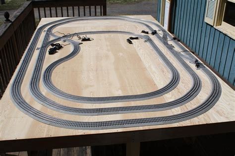 Lionel FasTrack O Gauge Layout 6 ft x 10 Ft | eBay | Model train layouts, Model train table ...