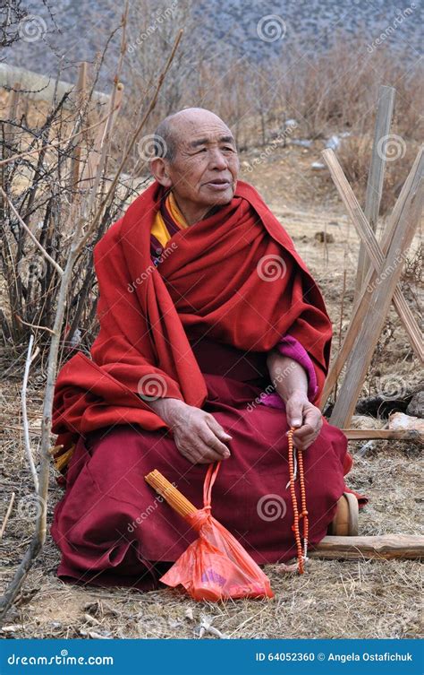 Tibetan Monk With Prayer Instrument Editorial Photo | CartoonDealer.com ...