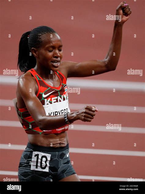 Tokyo, Kanto, Japan. 6th Aug, 2021. Faith Kipyegon (KEN) reacts after ...