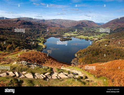 View over Grasmere and Grasmere village from Loughrigg Terrace in autumn, Lake District, Cumbria ...