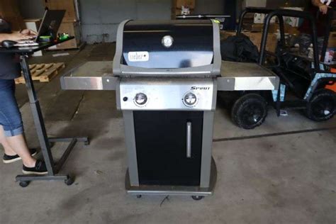 Weber 2 burner gas grill with cover - Matthews Auctioneers