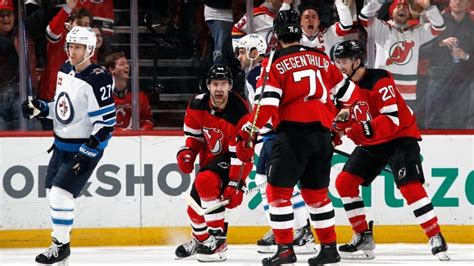 Wood scores winner as Devils defeat Jets with 3rd-period surge | CBC Sports