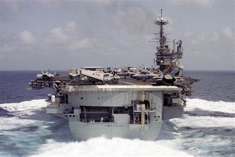 USS Independence (CV-62) Forrestal class carrier somewhere in the Pacific Ocean at high speed ...