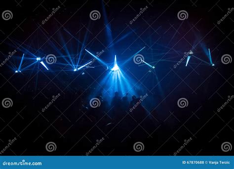 Concert Crowd in Front of LED Stage Lighting Effects Stock Photo ...