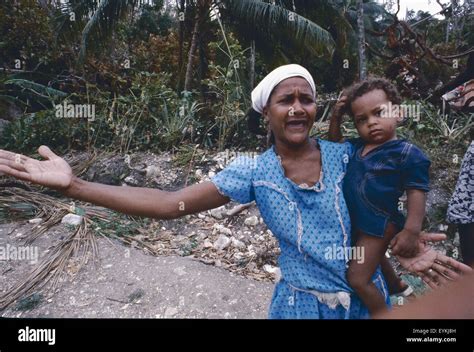 Haitian mother grieves just days after Hurricane Allen struck Haiti in ...