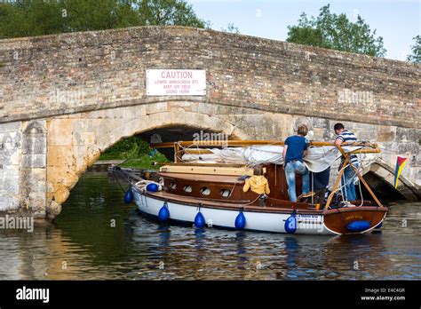 yacht passing under potter heigham bridge Norfolk Broads England UK ...