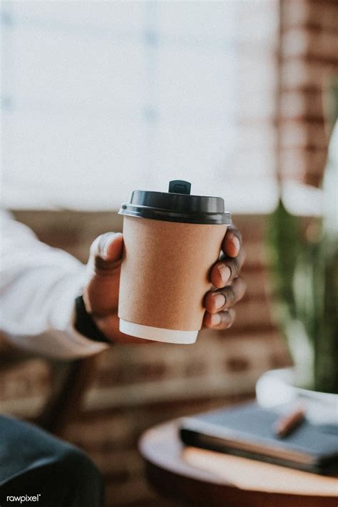 Download premium image of Man holding a takeaway coffee cup 1218991 in ...