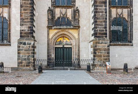 Thesis door at the Castle Church in Wittenberg. On the door, is the text of Luther's 95 theses ...