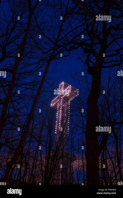 Mont Royal cross in Montreal city at dusk Stock Photo - Alamy