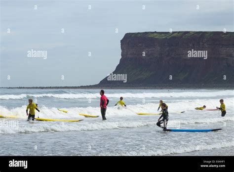 Surfing lesson children kids saltburn hi-res stock photography and ...