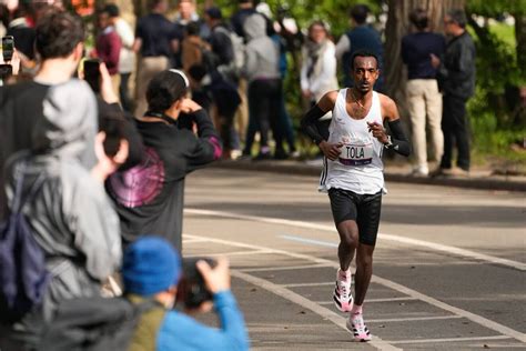 Tamirat Tola sets NYC Marathon course record to win men's race; Hellen ...