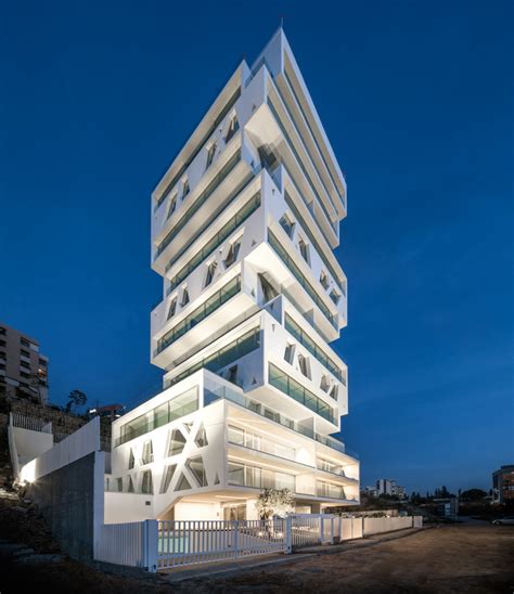 orange architects completes stacked residential tower overlooking ...