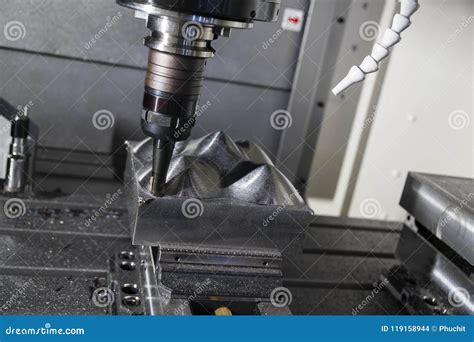 The CNC Milling Machine Cutting the Mold Part in Roughing Stock Photo ...