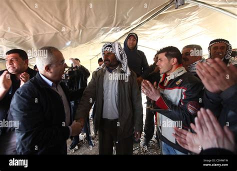 Palestinian Prime Minister Salam Fayyad visits the houses which were ...