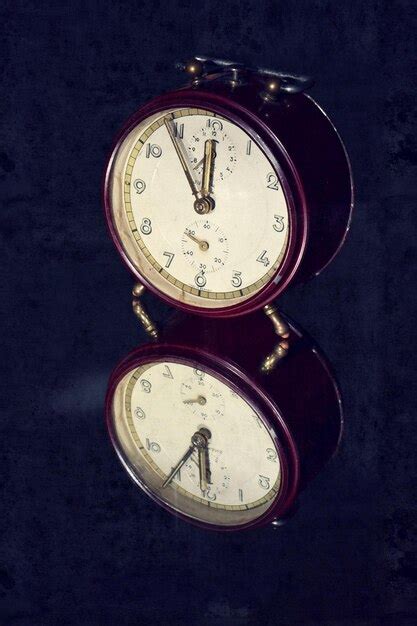 Premium Photo | Filtered picture of a vintage alarm clock