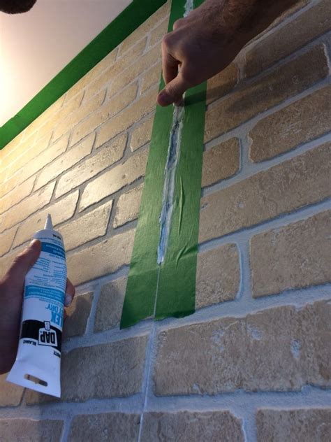 DIY: How to make a faux brick wall with textured panels | Faux brick, Faux brick walls, Diy faux ...