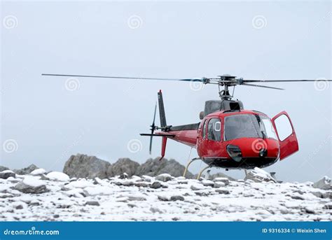 Helicopter Landing On The Mountain Stock Images - Image: 9316334