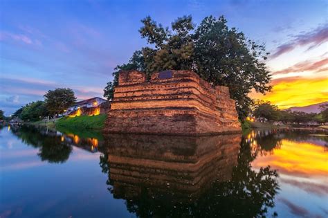 Premium Photo | Chiang mai old city ancient wall and moat with evening in chiang mai, thailand.