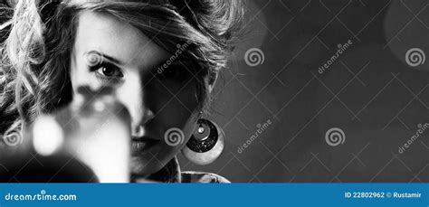 Attractive Girl Pointing A Gun. Closeup Portrait Stock Photography ...