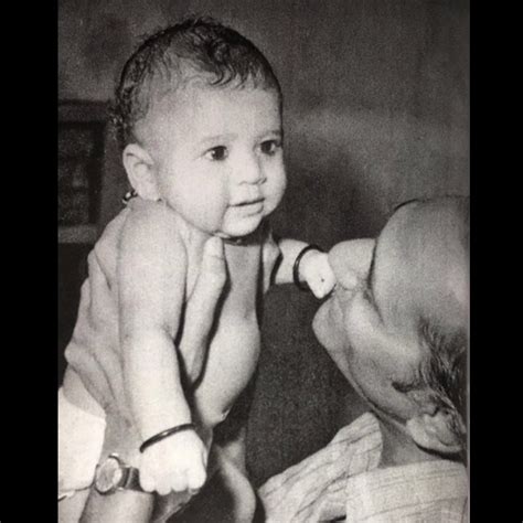 Very young Sachin Tendulkar in arms of his father Ramesh Tendulkar